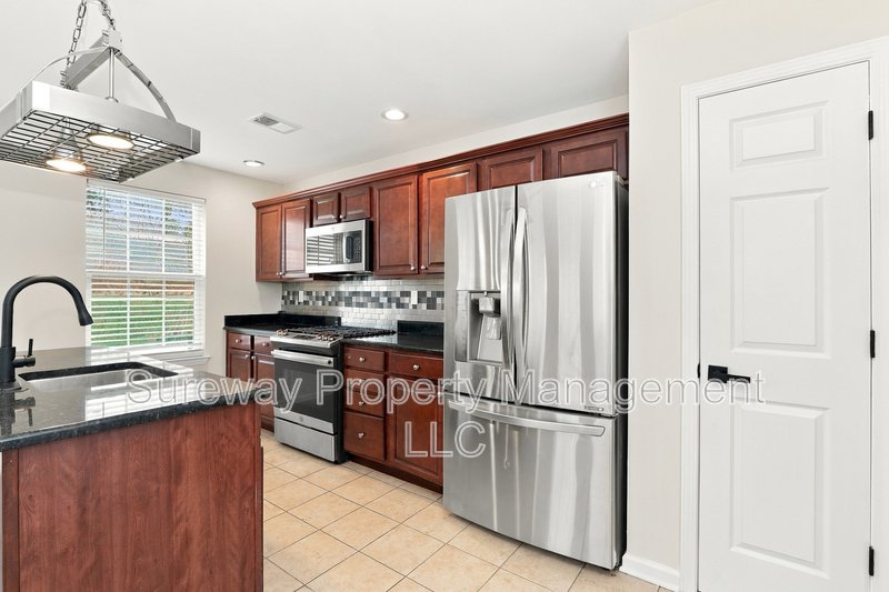 Three-Level Townhome with 3 Bedrooms, 2.5 Baths & Private Garage property image