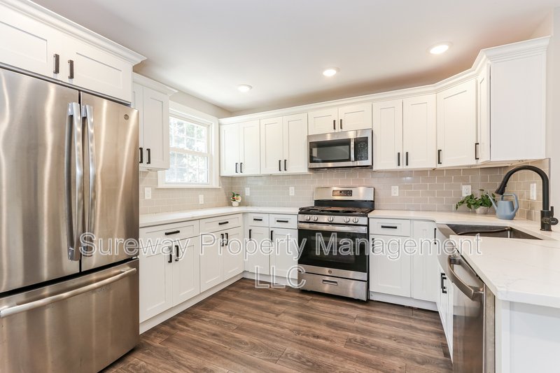 Beautifully Renovated 4 Bedroom, 2 Bath Single Family Home property image